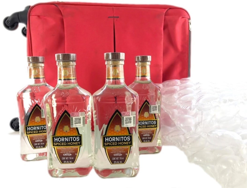 Cuantas botellas de alcohol puedo llevar a mexico